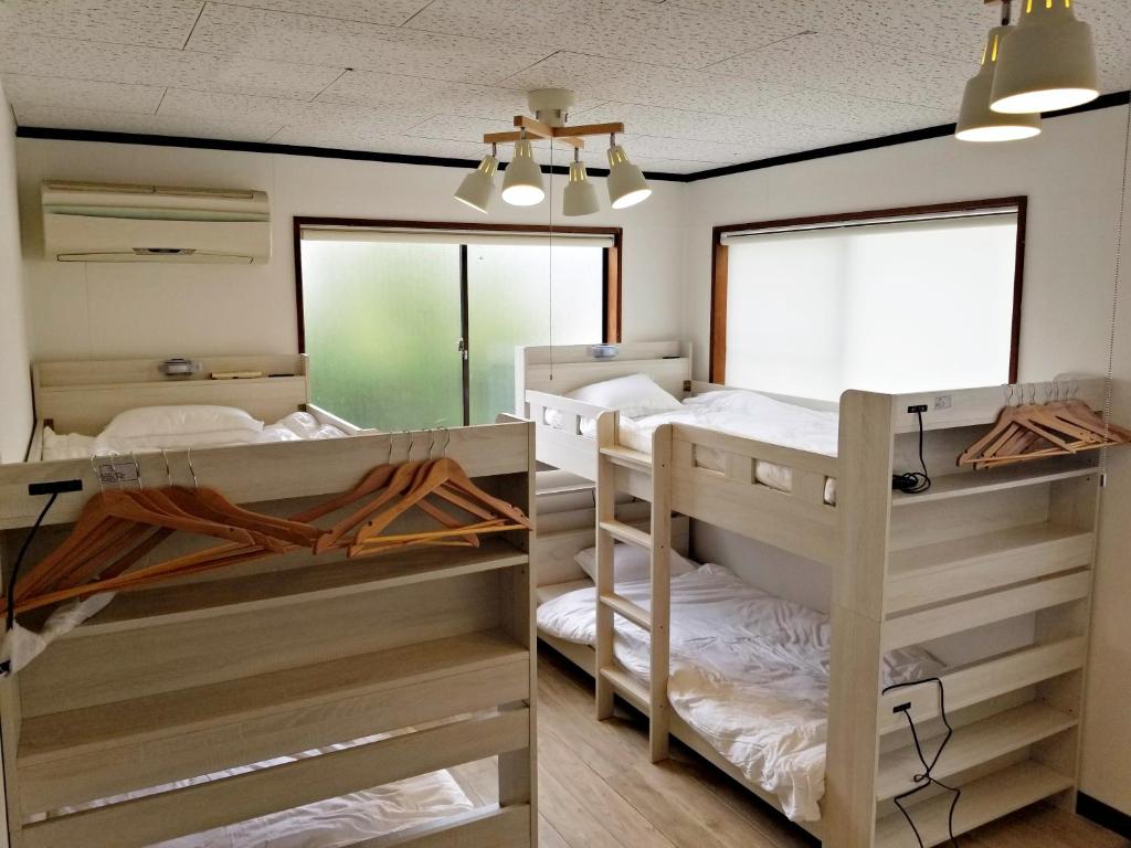 Postel nebo postele na pokoji v ubytování Guest House Tatara