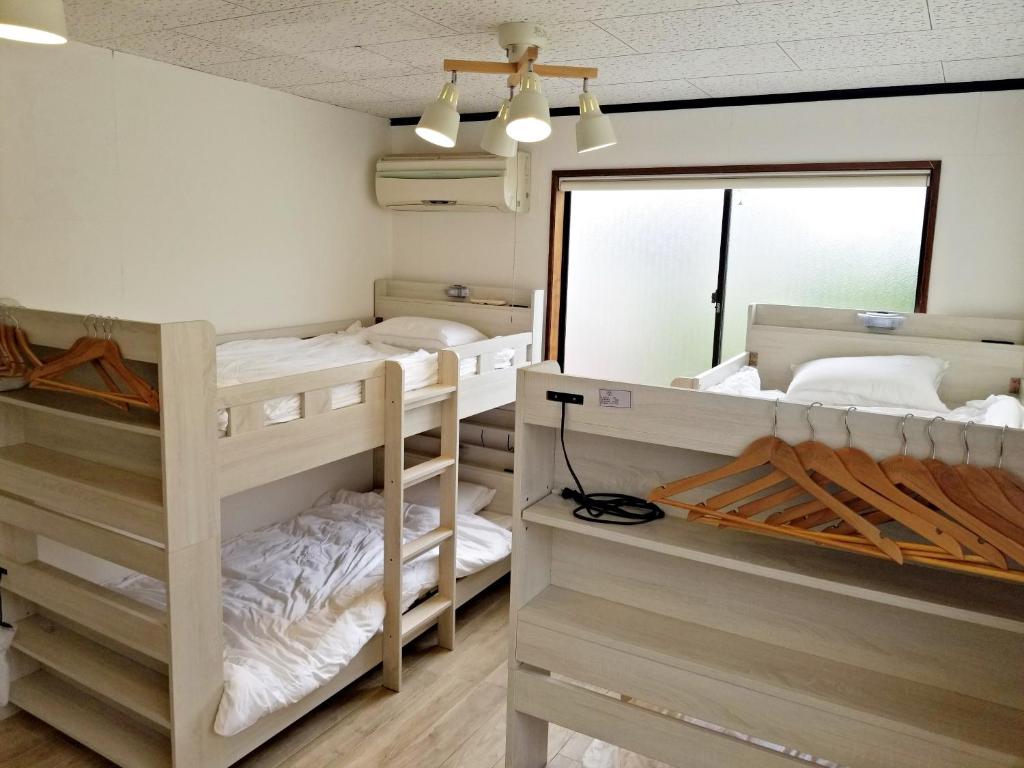 Postel nebo postele na pokoji v ubytování Guest House Tatara