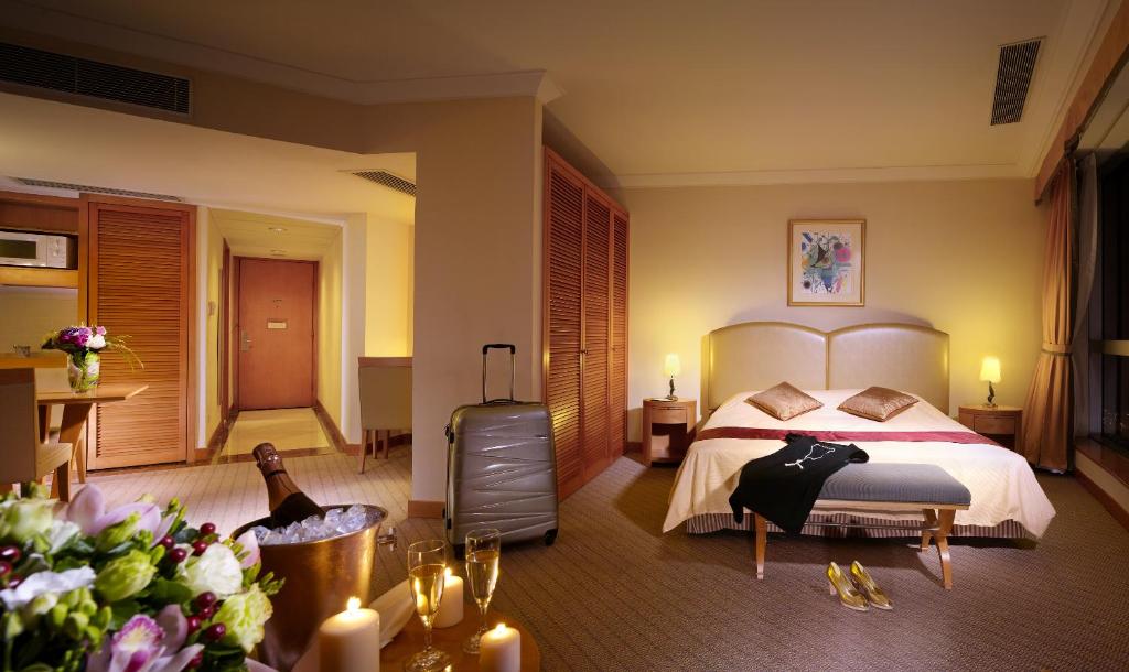 Postel nebo postele na pokoji v ubytování Harbour Plaza Resort City