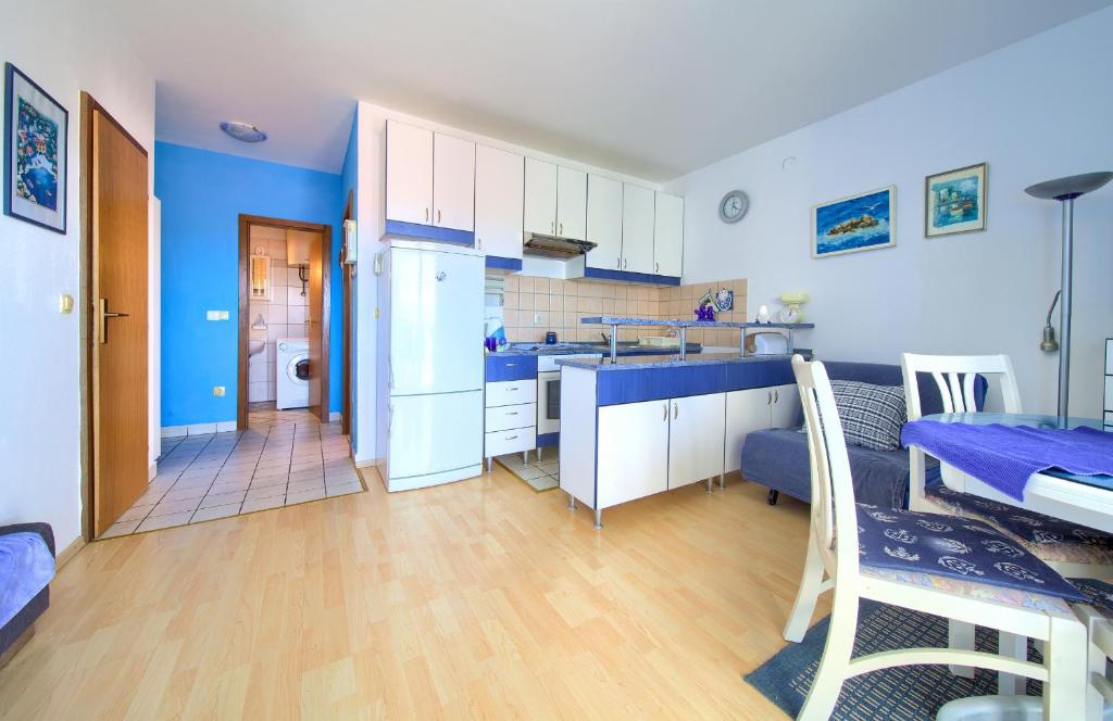Kuchyň nebo kuchyňský kout v ubytování Apartment Henrik