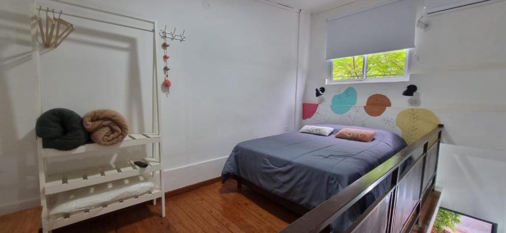 Postel nebo postele na pokoji v ubytování Loft Costanera