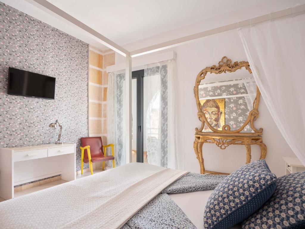 Postel nebo postele na pokoji v ubytování Bella Colina I Vintage Hotel 1953