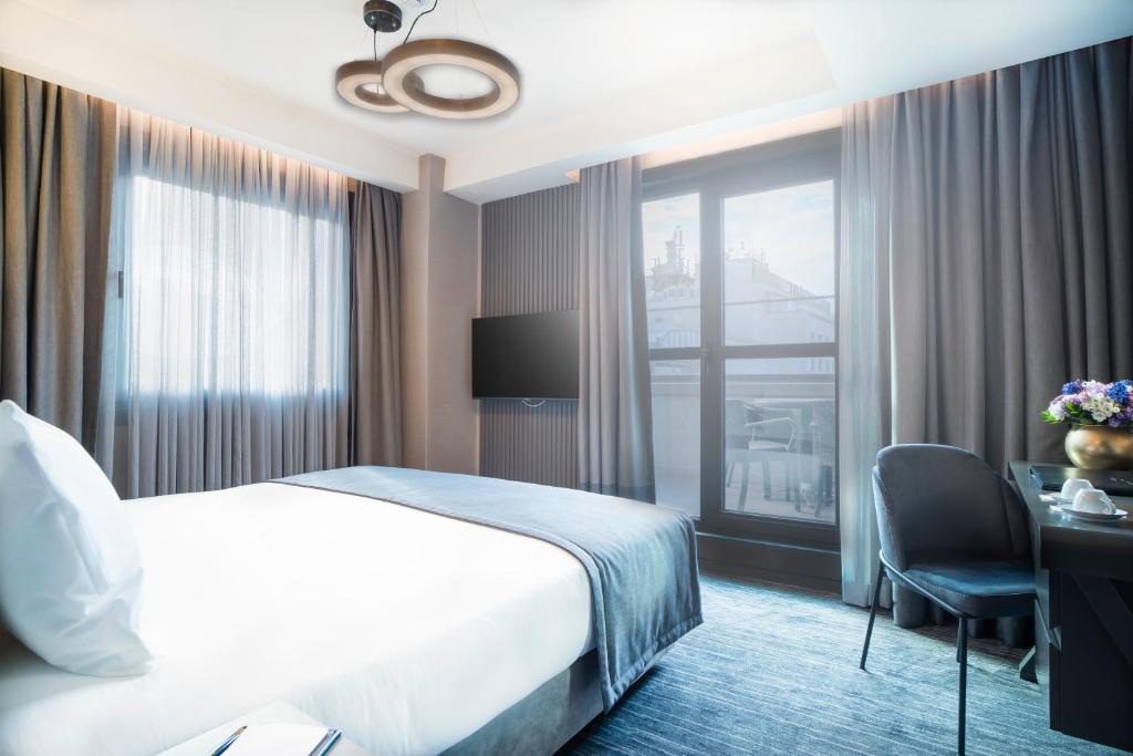 Arts Hotel Taksim客房内的一张或多张床位