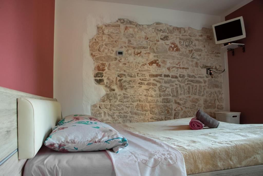 Postel nebo postele na pokoji v ubytování Casa Piccola