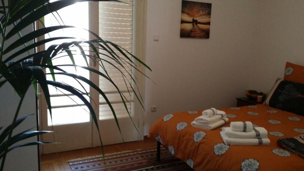 Postel nebo postele na pokoji v ubytování Rooms in Central Athens