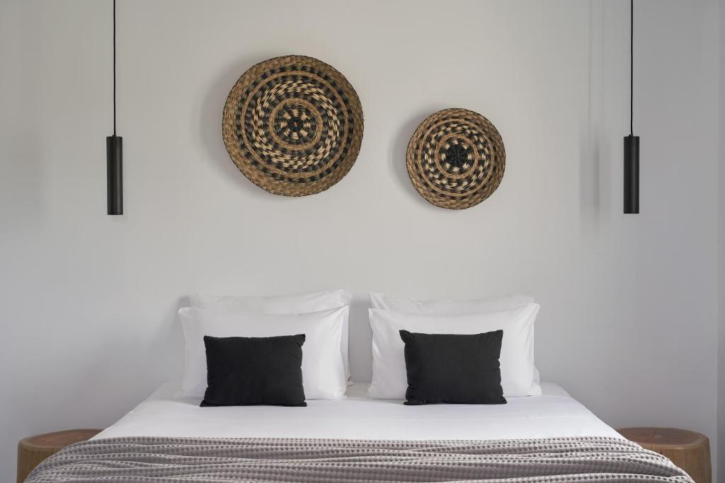 A bed or beds in a room at The Thermia Suites