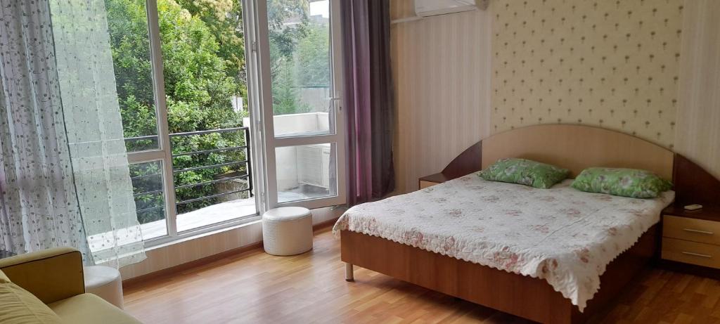 Postel nebo postele na pokoji v ubytování Lily Pearls Inn