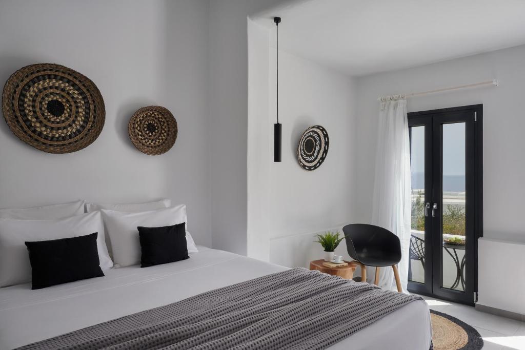 A bed or beds in a room at The Thermia Suites