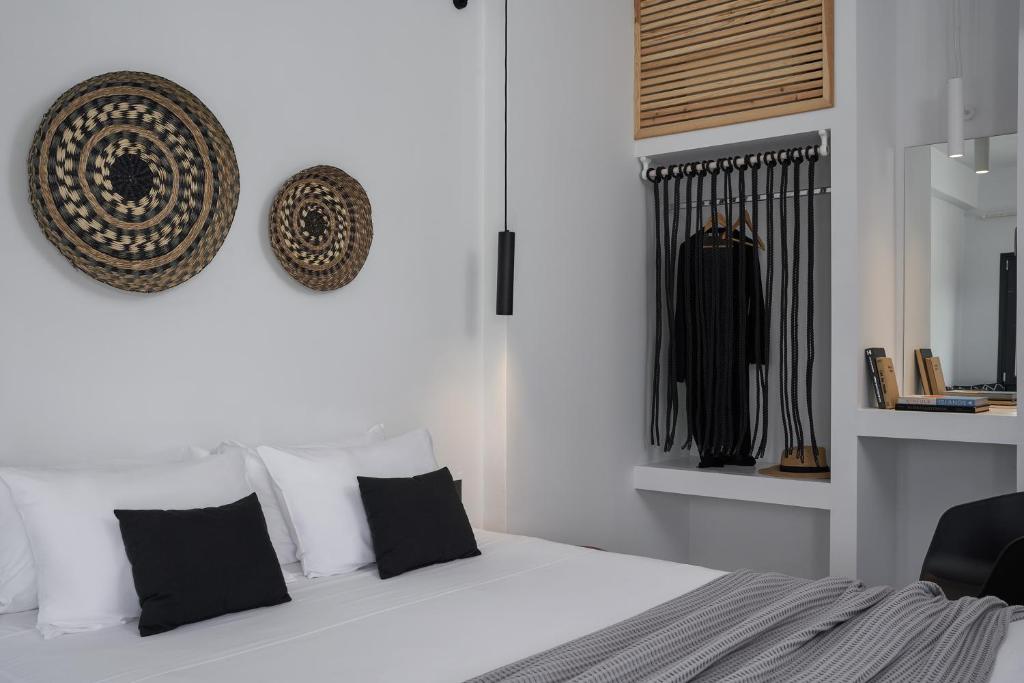A bed or beds in a room at The Thermia Suites