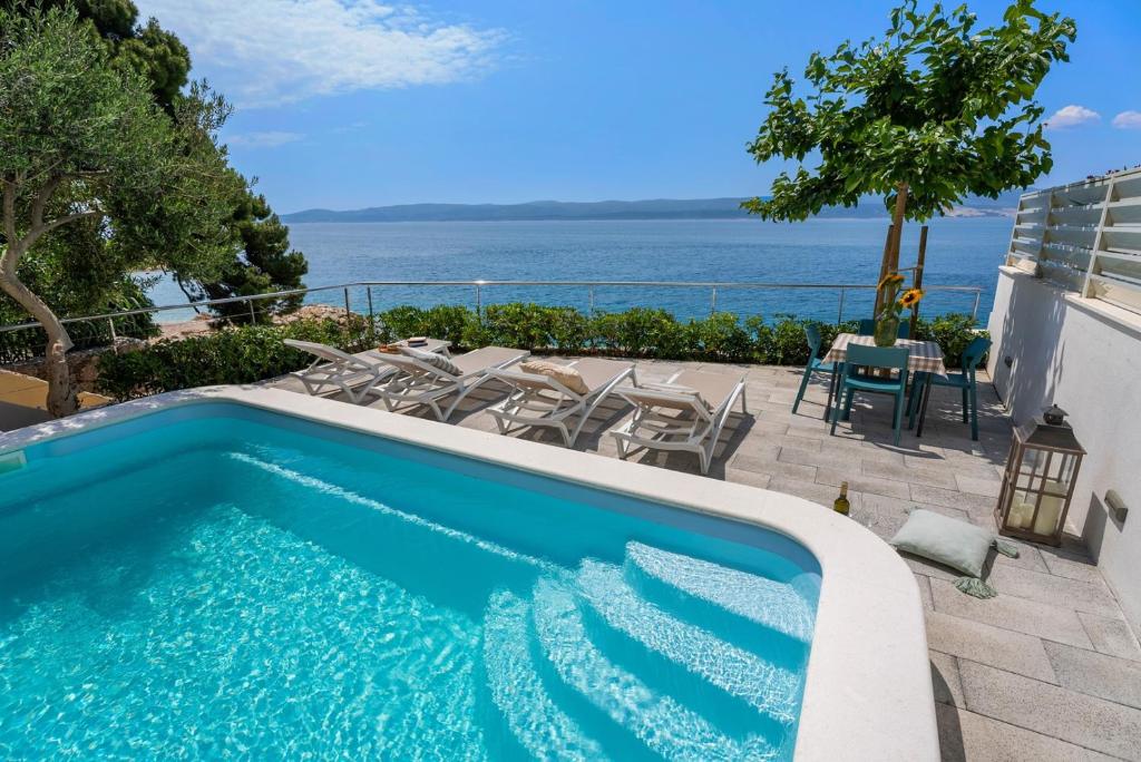 Bazén v ubytování "Villa Del Mar" Beach Villa nebo v jeho okolí