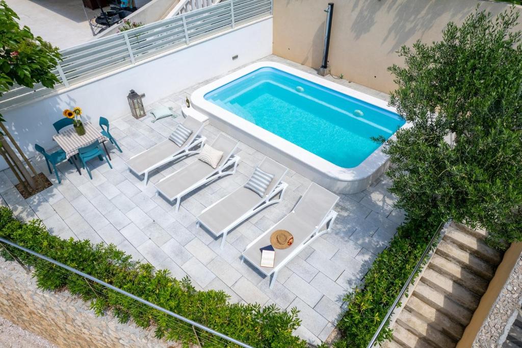 Bazén v ubytování "Villa Del Mar" Beach Villa nebo v jeho okolí