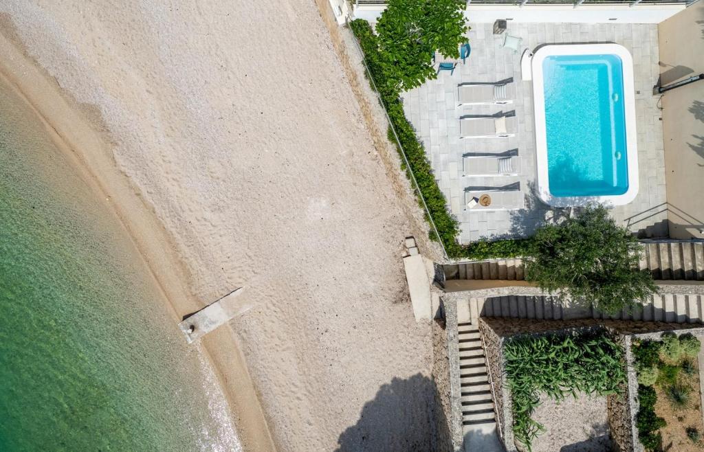 Bazén v ubytování "Villa Del Mar" Beach Villa nebo v jeho okolí