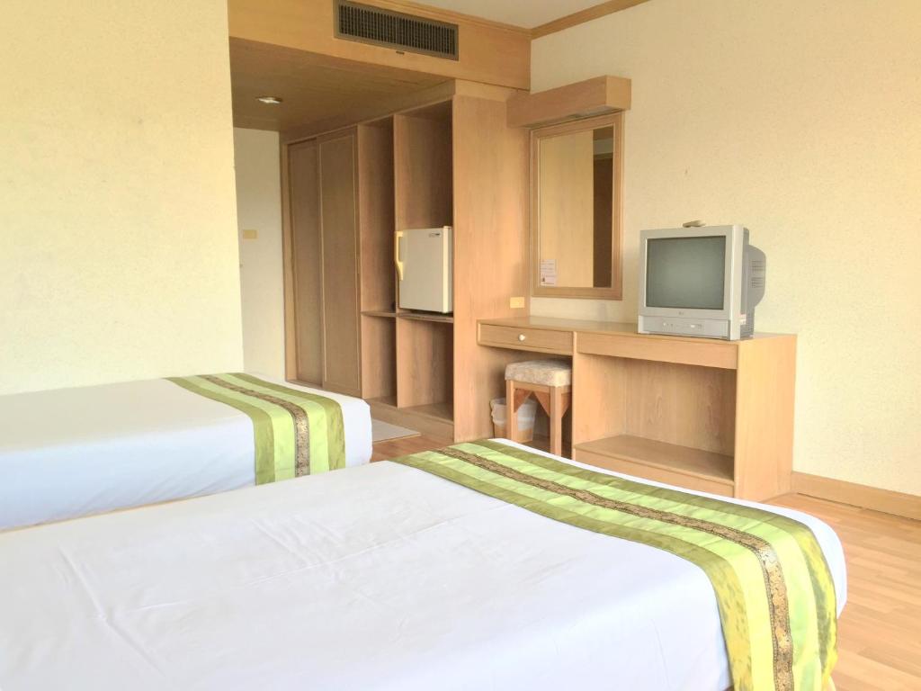 Postel nebo postele na pokoji v ubytování Takiab Beach Resort