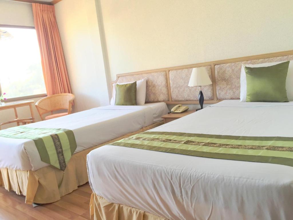 Postel nebo postele na pokoji v ubytování Takiab Beach Resort
