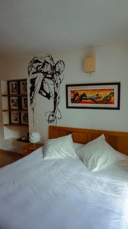 Postel nebo postele na pokoji v ubytování Hôtel la Fête en Provence