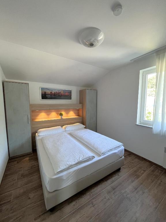 Postel nebo postele na pokoji v ubytování Apartments Roemerschlucht