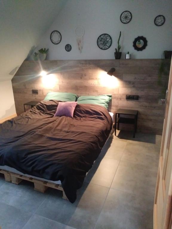 Postel nebo postele na pokoji v ubytování Apartamenty Zielone Drzwi
