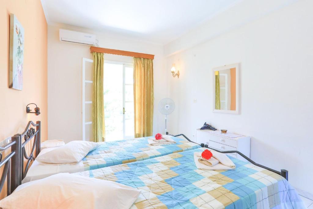 Postel nebo postele na pokoji v ubytování Fran Apartments