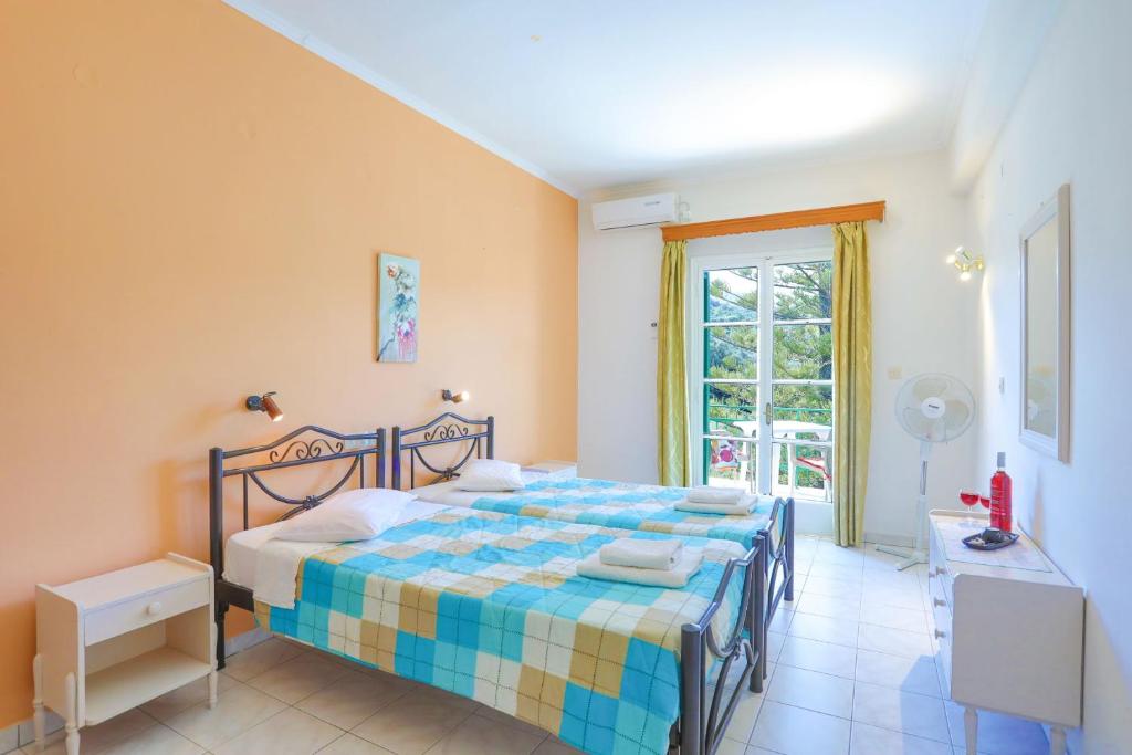 Postel nebo postele na pokoji v ubytování Fran Apartments