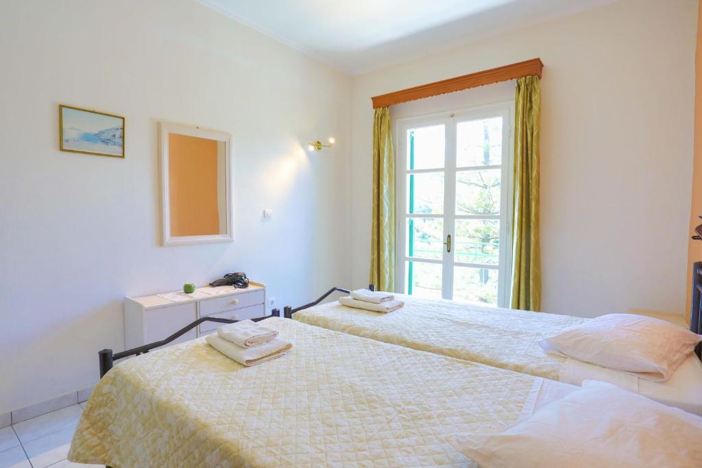 Postel nebo postele na pokoji v ubytování Fran Apartments