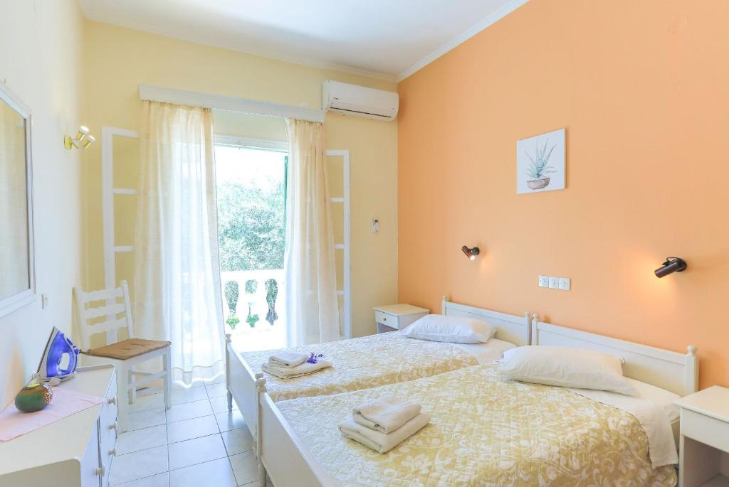 Postel nebo postele na pokoji v ubytování Fran Apartments