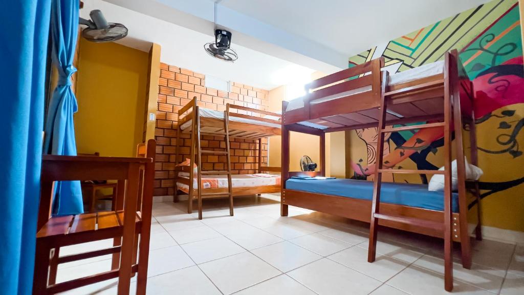 Postel nebo postele na pokoji v ubytování El Mural Backpackers