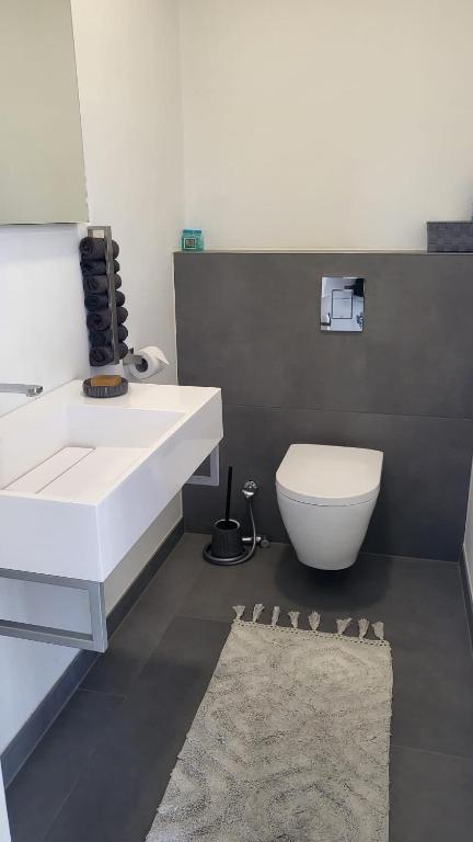 Koupelna v ubytování Apartman s bazénem a saunou
