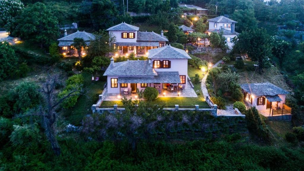 an aerial view of a home at night at Gardenia Studios in Mouresi