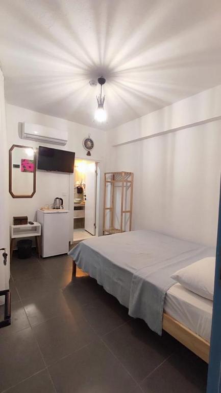 A bed or beds in a room at ÇAKIR BUTİK OTEL