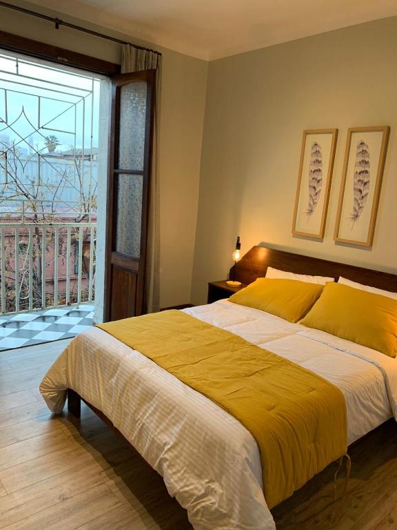 Postel nebo postele na pokoji v ubytování Hotel Casa Aure