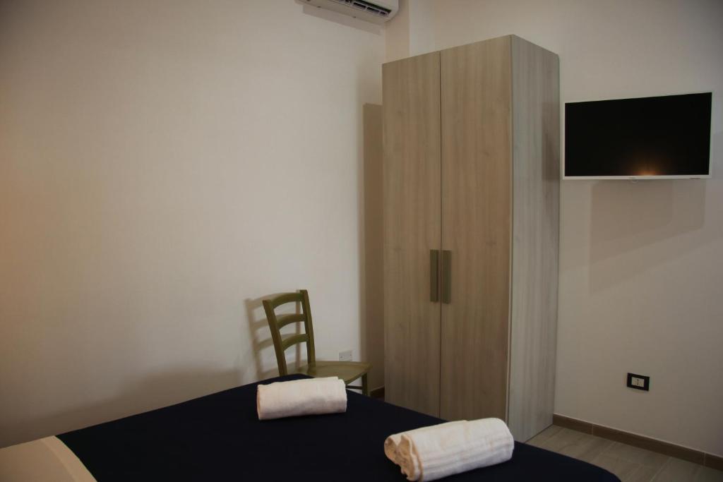 TV a/nebo společenská místnost v ubytování Apartments Capuana