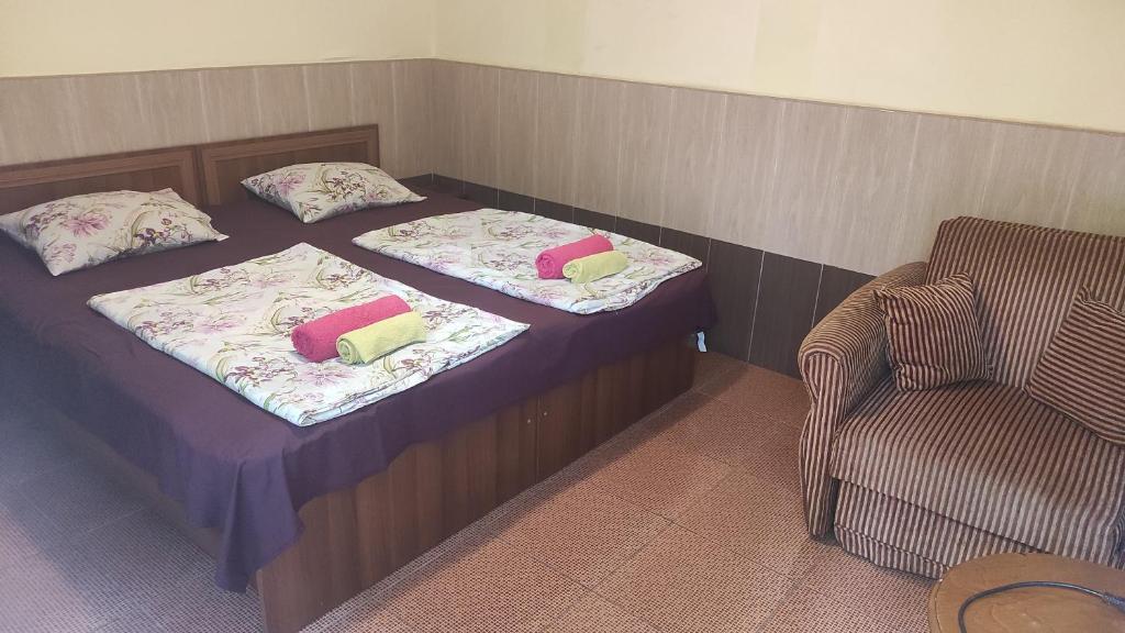 Postel nebo postele na pokoji v ubytování Guesthouse in Batumi 97