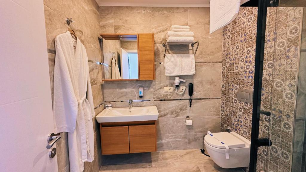Koupelna v ubytování BİLİRİS HOTEL