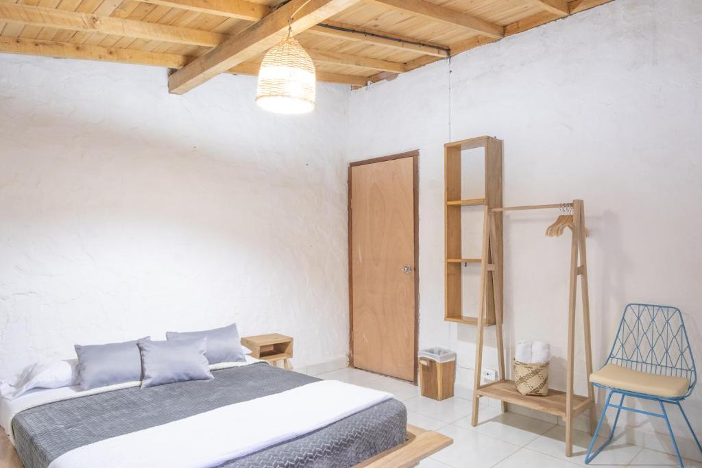 Postel nebo postele na pokoji v ubytování Casa Profunda - Santa Elena