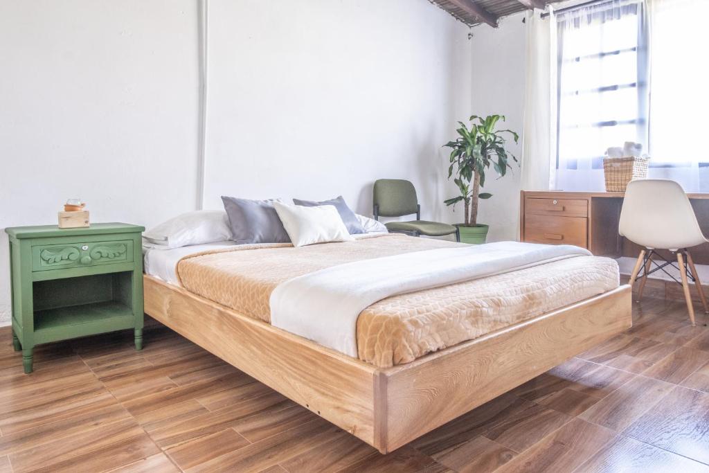 Postel nebo postele na pokoji v ubytování Casa Profunda - Santa Elena