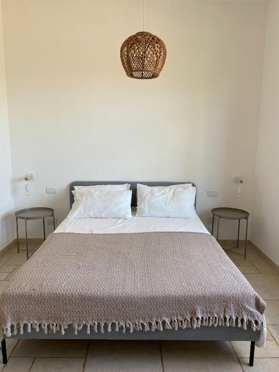 Postel nebo postele na pokoji v ubytování Villa Giulio Polignano
