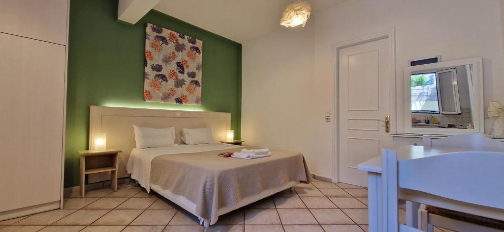 Posteľ alebo postele v izbe v ubytovaní Panorama Apartments Fiscardo