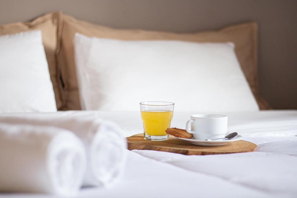 Posteľ alebo postele v izbe v ubytovaní Evita's Resort