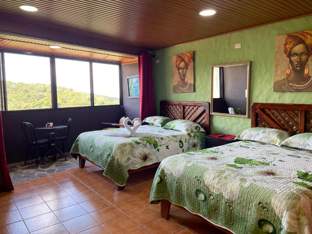 Postel nebo postele na pokoji v ubytování Cabinas Vista Al Golffo