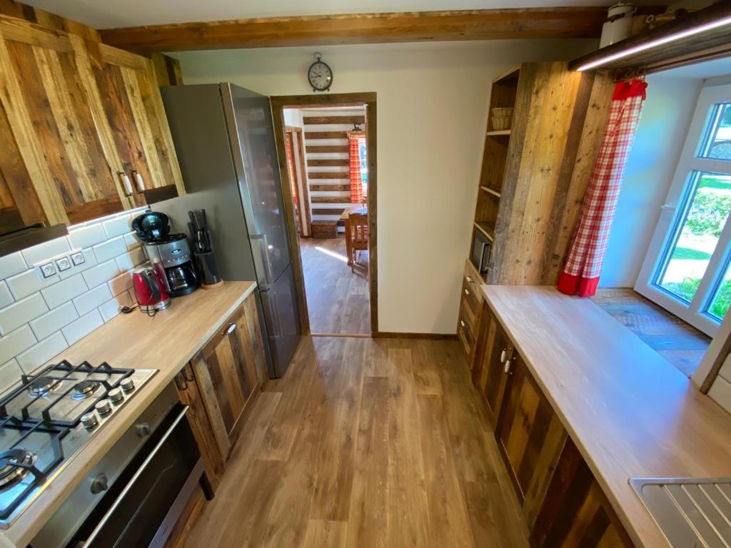 Kuchyň nebo kuchyňský kout v ubytování Apartmány u Dostálů