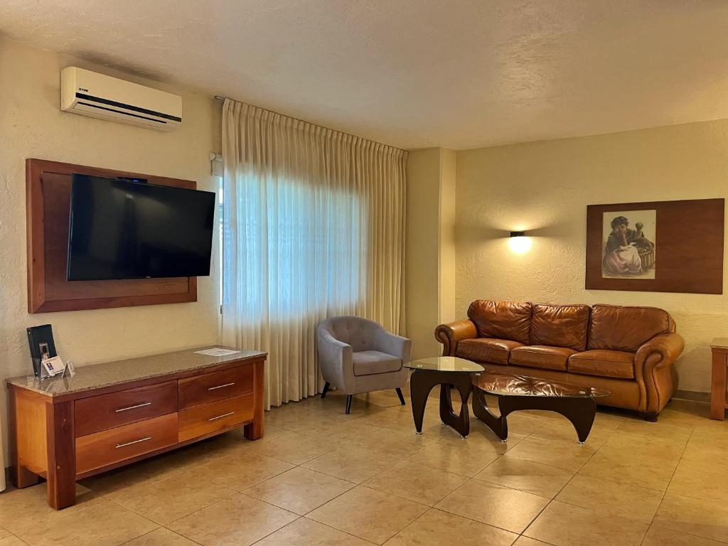 TV a/nebo společenská místnost v ubytování Comfort Inn Cordoba
