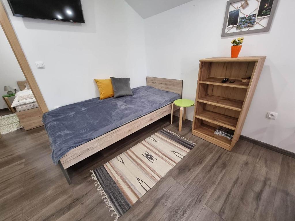 Postel nebo postele na pokoji v ubytování Apartmaji Ribic