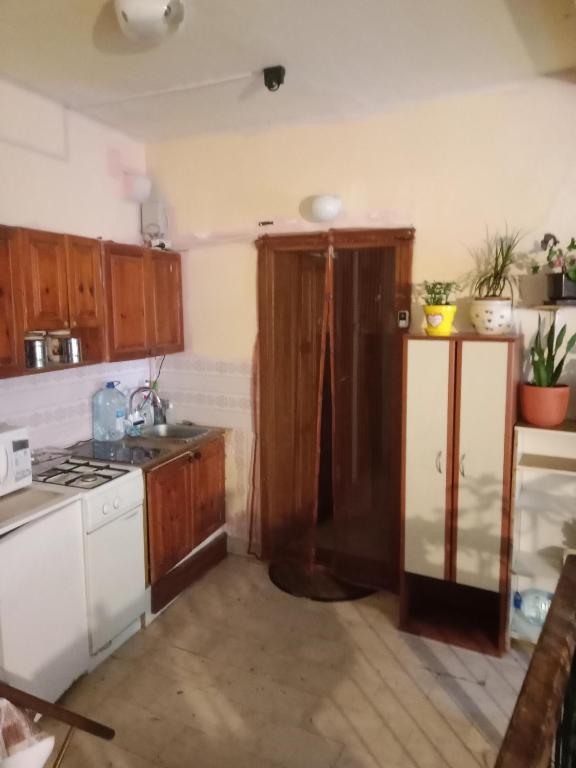 Kuchyňa alebo kuchynka v ubytovaní Centar Starog Grada