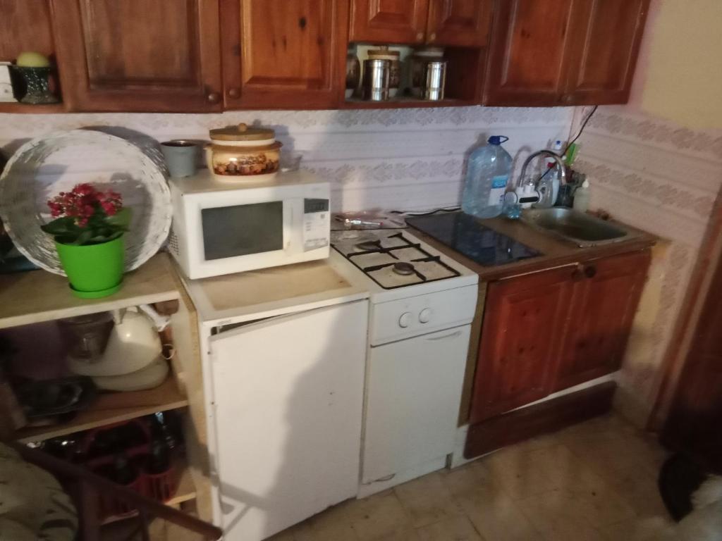 Kuchyňa alebo kuchynka v ubytovaní Centar Starog Grada
