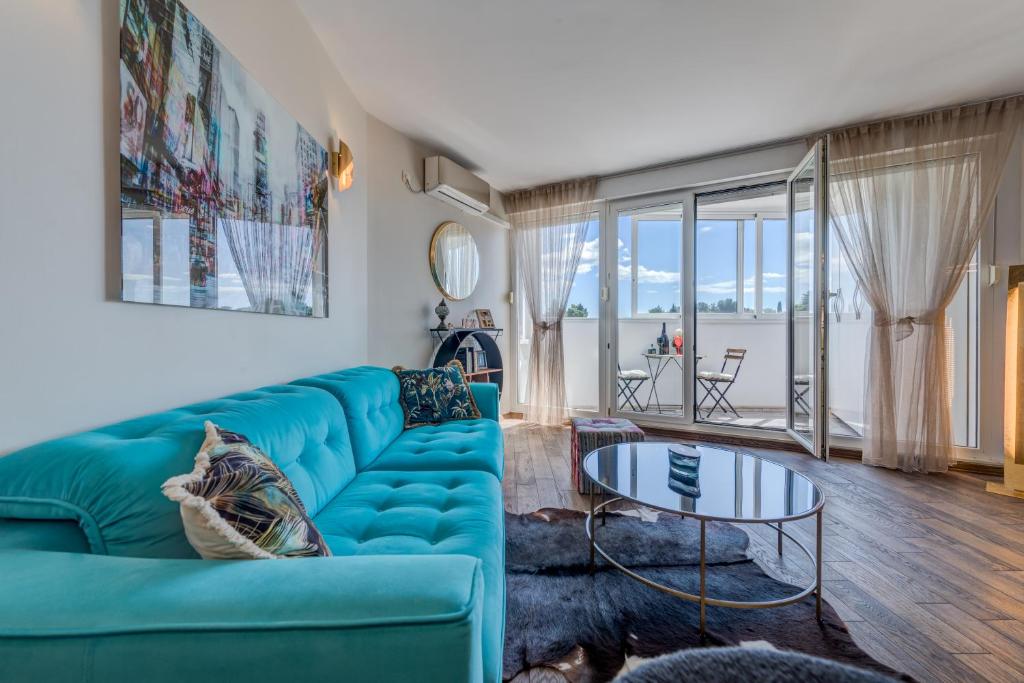 Posezení v ubytování LORI APARTMENT