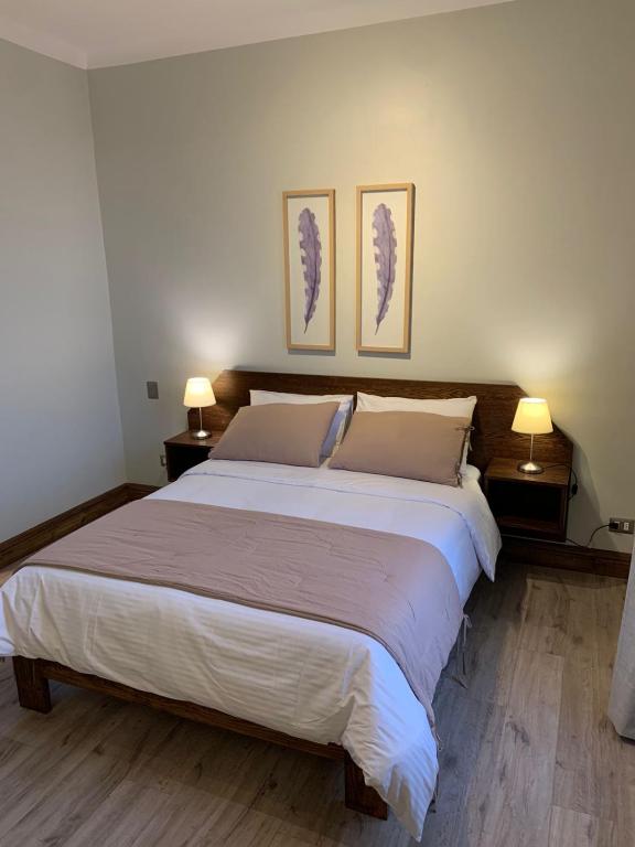 Postel nebo postele na pokoji v ubytování Hotel Casa Aure