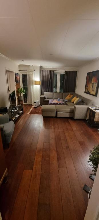 a living room with a couch and a table at Apartement in Drammen close to the main city in Drammen