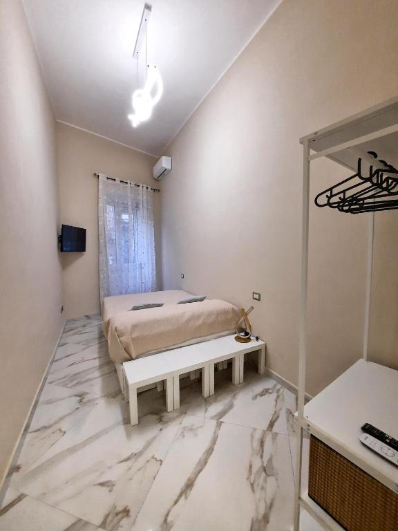 Posteľ alebo postele v izbe v ubytovaní Re Ferdinando Apartment