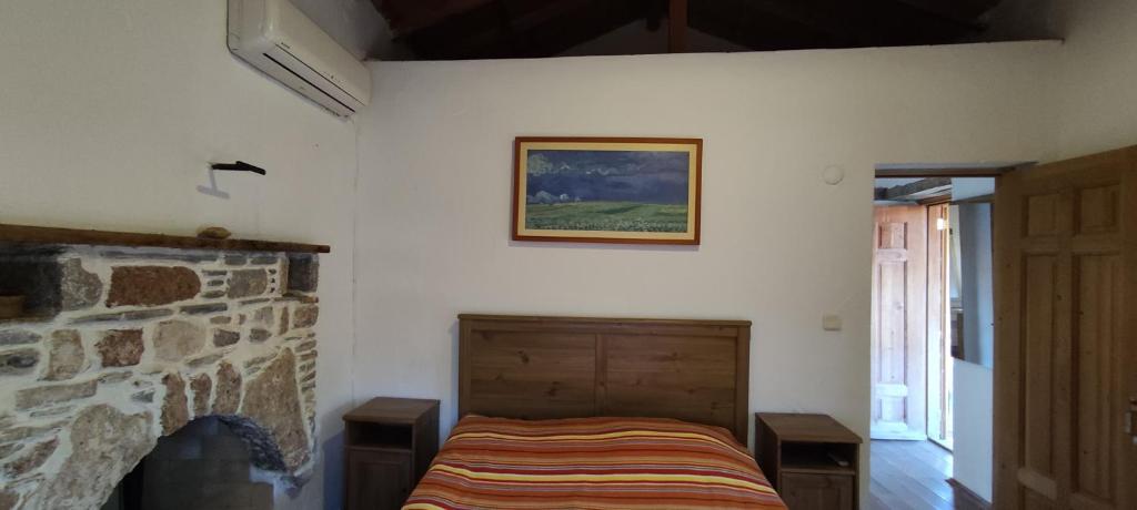 Un pat sau paturi într-o cameră la Eski Datca Evleri