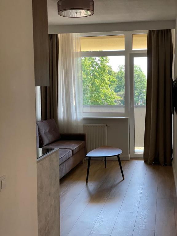 TV a/nebo společenská místnost v ubytování Good Space Palanga